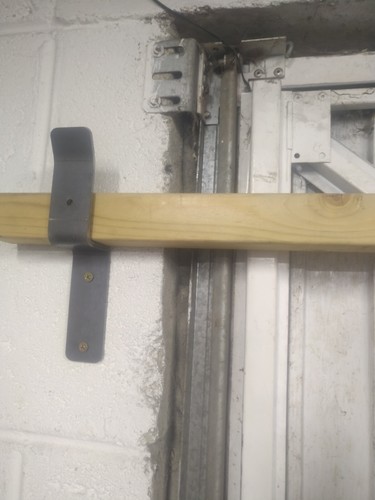 Garage door barricade - door,